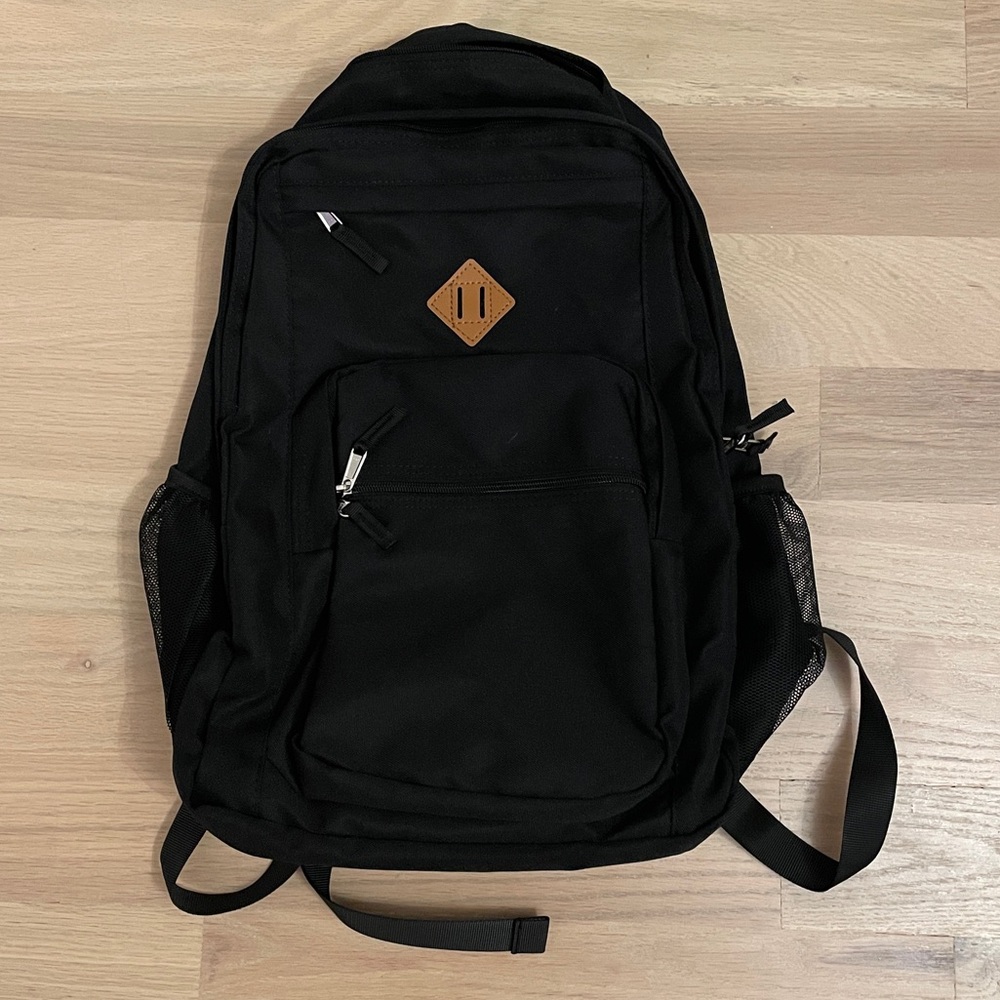 Simple Black Backpack with Tan Logo
